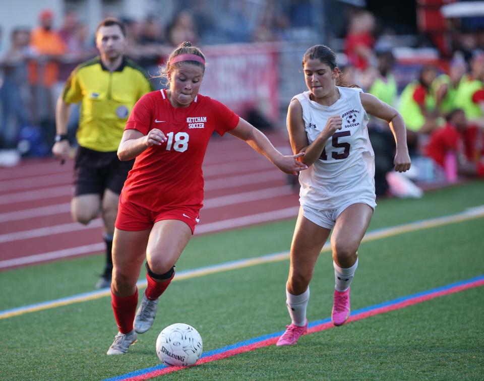 Ketcham's Peyton Kangas breaks away from Ossining's Kelly Hoffman during Tuesday's girls soccer game in Wappingers Falls on September 12, 2023.