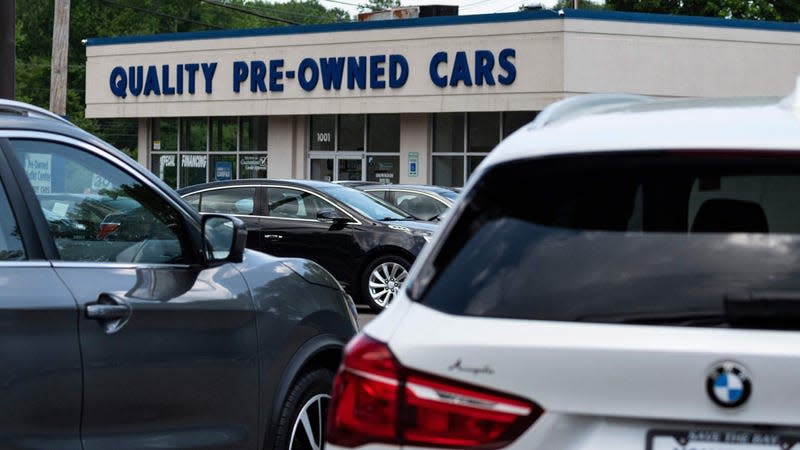 Used car dealer with a variety of cars on the lot