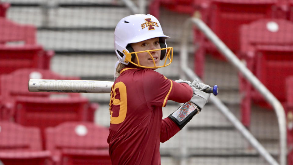 FILE - Iowa State's Lea Nelson bats against North Texas during an NCAA college softball game Friday, March 3, 2023, in Fayetteville, Ark. West Virginia doesn’t have a softball team. Iowa State has no baseball team. So a friendship was formed between the Big 12 schools' existing squads on the diamond as well as among their fans. (AP Photo/Michael Woods, File)