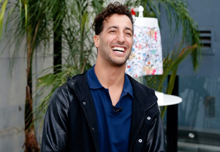 Extra attention: Red Bull's Australian driver Daniel Ricciardo smiles during a promotional event ahead of the Australian Grand Prix in Melbourne this week