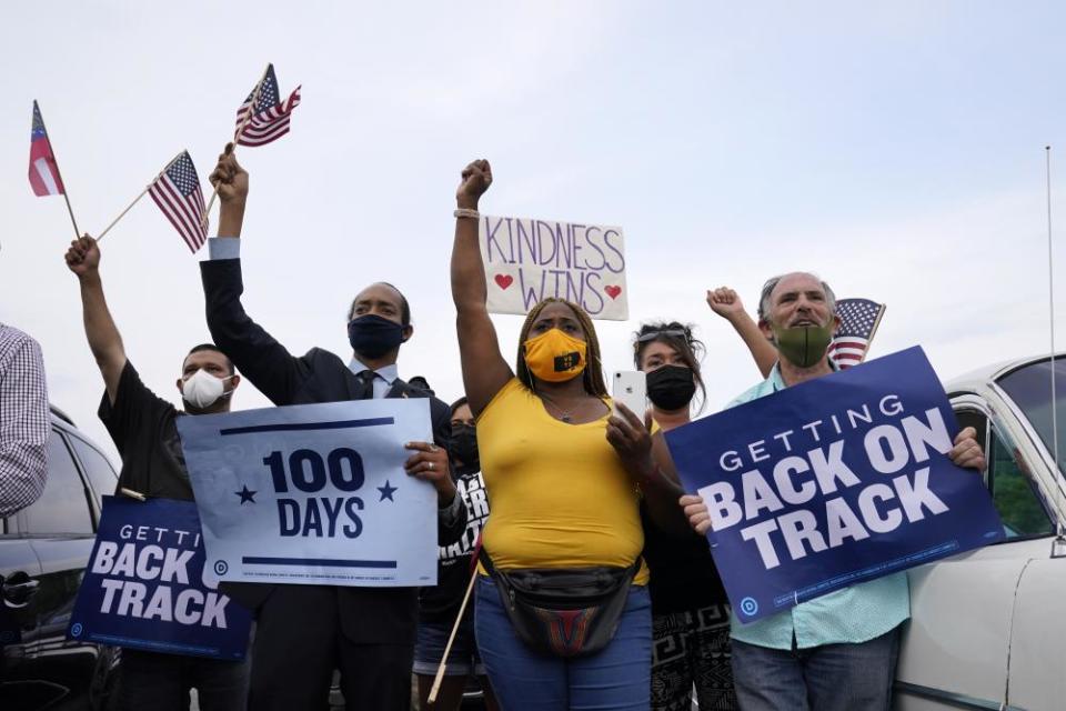 People cheer as Biden speaks in Georgia, a state that was critical to his 2020 victory.