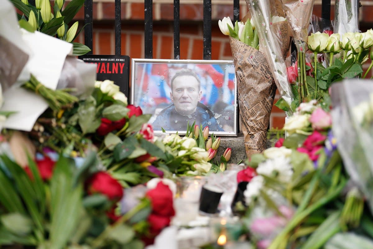 Floral tributes outside the Russian Embassy in London for jailed Russian opposition leader Alexei Navalny following his death (Jordan Pettitt/PA) (PA Wire)