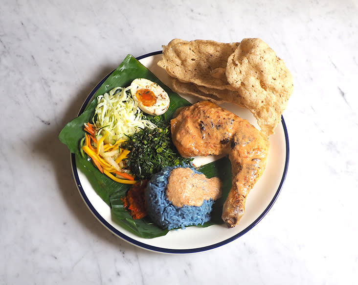 The 'nasi kerabu' set with grilled chicken topped with 'percik' sauce delivers a wholesome taste — Pictures by Lee Khang Yi