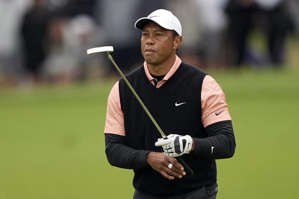 FILE - Tiger Woods plays during the third round of the PGA Championship golf tournament at Southern Hills Country Club, Saturday, May 21, 2022, in Tulsa, Okla. Woods is back at Riviera, this time with more on his plate than handing out the trophy in the Genesis Invitational. He returns to the PGA Tour for the first time since July. (AP Photo/Matt York, File)