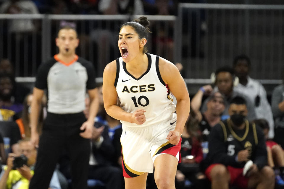 Las Vegas Aces' Kelsey Plum yells out after scoring during the second half of the WNBA Commissioner's Cup basketball game against the Chicago Sky Tuesday, July 26, 2022, in Chicago. The Aces won 93-83. (AP Photo/Charles Rex Arbogast)