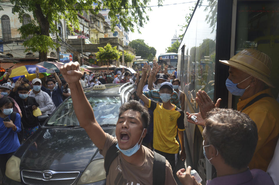 Anti-coup protesters shout slogans during a demonstration on Thursday, May 6, 2021, in Yangon, Myanmar. More than 200 global organizations urged the U.N. Security Council on Wednesday, May 5, 2021, to impose an arms embargo on Myanmar, saying the time for statements has passed and immediate action is needed to help protect peaceful protesters against military rule and other opponents of the junta. (AP Photo)