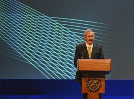 Cuba's President Raul Castro addresses the audience during the opening session of the Community of Latin American and Caribbean States (CELAC) summit in Havana January 28, 2014. REUTERS/Adalberto Roque/Pool