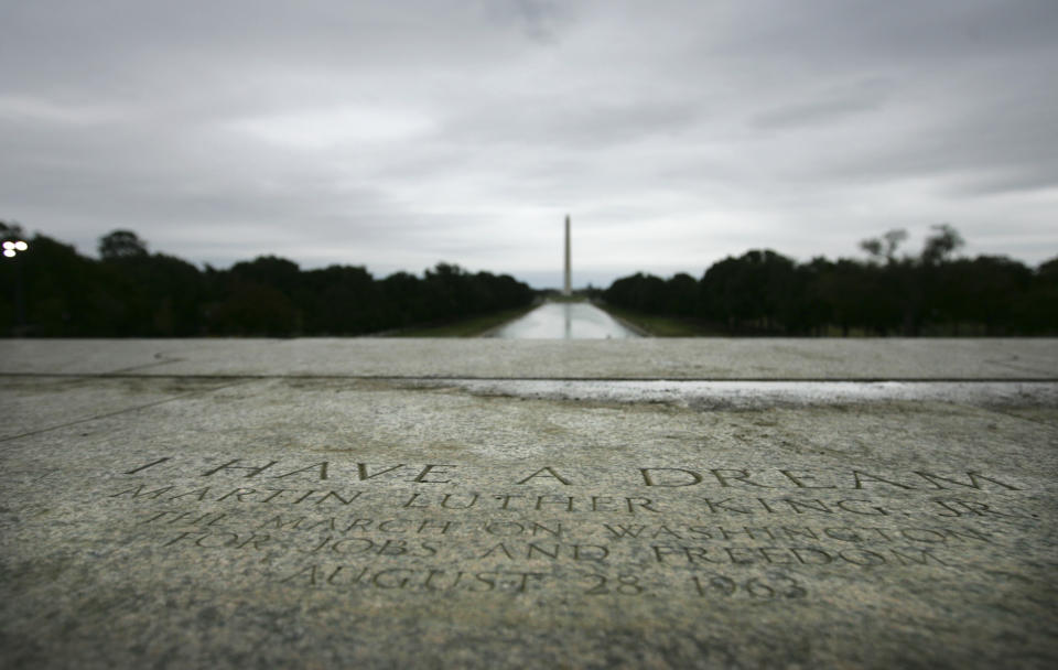 FILE - A stone slab marks the spot of the "I have a dream" speech at the Lincoln Memorial in Washington, Thursday, Aug. 28, 2008 - the 45th anniversary of the Rev. Martin Luther King's speech on the steps of the Lincoln Memorial. (AP Photo/Lawrence Jackson, File)