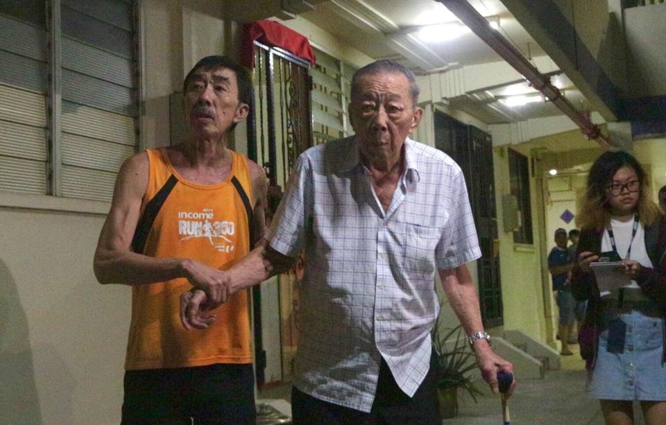 Photo (right): An elderly resident who is believed to be the father of a 50-year-old man who was arrested at Blk 114 Ho Ching Road on 20 March 2018 for criminal intimidation and drug-related offences. Photo: Dhany Osman/Yahoo News Singapore