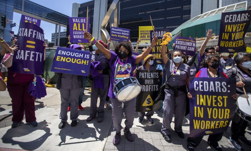 LOS ANGELES, CA - MAY 09: Members of the Service Employees International Union-United Healthcare Workers West started weeklong strike today at Cedars-Sinai Medical Center on Monday, May 9, 2022 in Los Angeles, CA. Workers are alleging safety concerns, short-staffing and low wages at the hospital. Among the workers taking part are nursing assistants, lab technicians, surgical technicians and plant operations workers. (Francine Orr / Los Angeles Times)