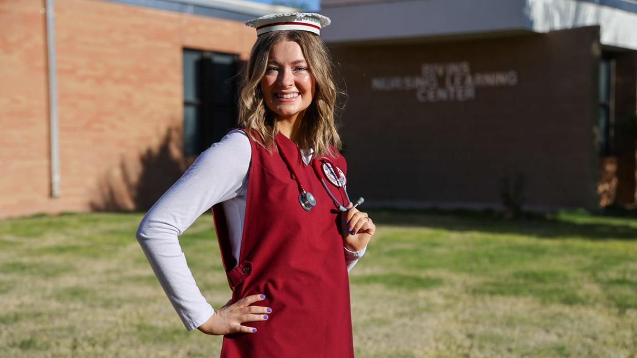 Jaedyn Reimer, a senior nursing major from Canyon, models a West Texas A&M University nursing uniform from the 1970s. WT's Laura and Joe Street School of Nursing will celebrate its 50th anniversary with “Stethoscopes and Stilettos,” a May 3 fundraising dinner.