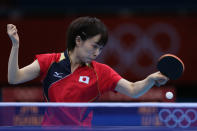 LONDON, ENGLAND - JULY 29: Kasumi Ishikawa of Japan plays a forehand in her Women's Singles Table Tennis third round match against Li Qiangbing of Austria on Day 2 of the London 2012 Olympic Games at ExCeL on July 29, 2012 in London, England. (Photo by Feng Li/Getty Images)