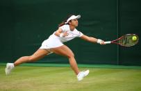 <p>Misaki Doi of Japan plays a forehand during the Ladies Singles second round match against Kristyna Pliskova of Czech Republic on day four of the Wimbledon Lawn Tennis Championships at the All England Lawn Tennis and Croquet Club on June 30, 2016 in London, England. (Photo by Clive Brunskill/Getty Images)</p>