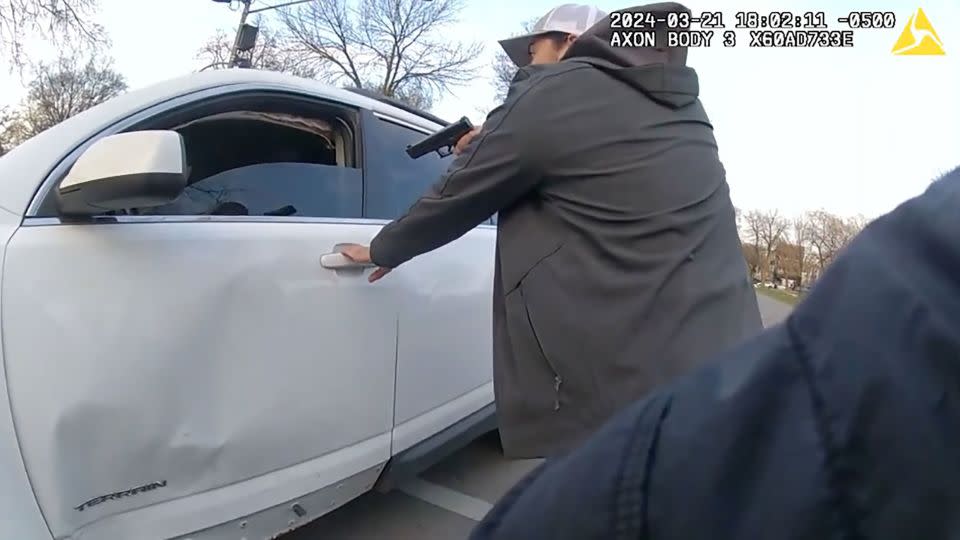 A Chicago police officer gives Dexter Reed several commands before gunfire breaks out. - COPA Chicago