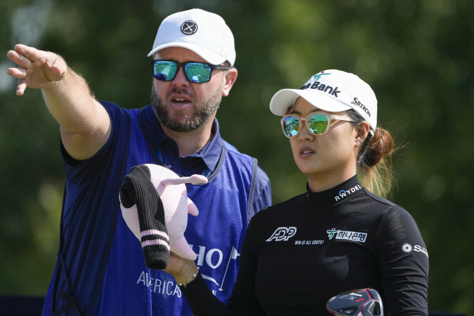 Minjee Lee, of Australia, sets up her shot off the 18th tee during the first round of the Mizuho Americas Open golf tournament, Thursday, June 1, 2023, at Liberty National Golf Course in Jersey City, N.J. (AP Photo/John Minchillo)