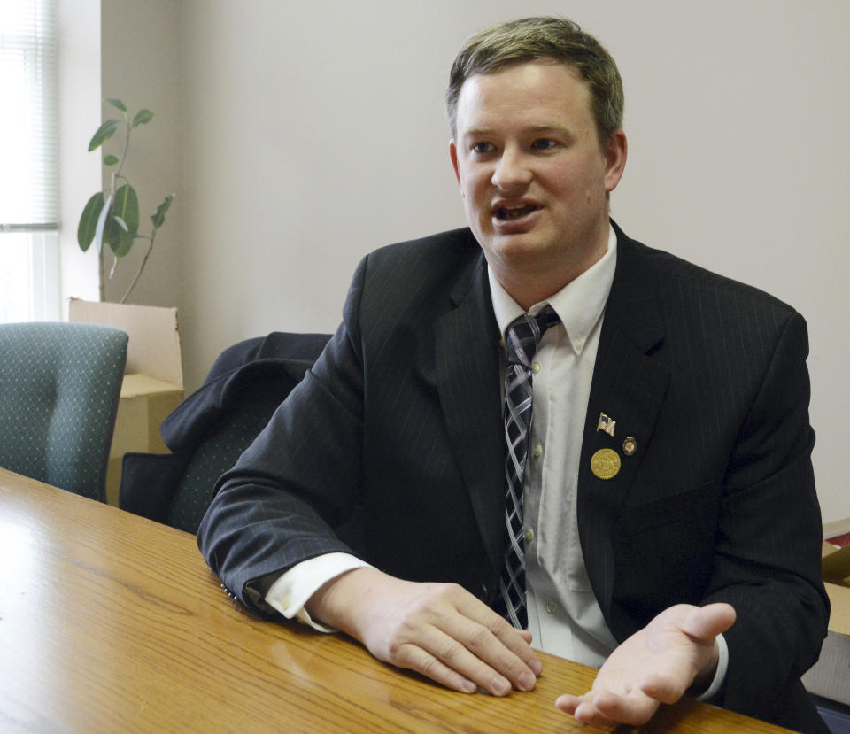 FILE - In this Feb. 23, 2014, file photo Jason Ravnsborg speaks in Sioux Falls, S.D. South Dakota Gov. Kristi Noem is calling for the resignation of the state's attorney general who is facing misdemeanor charges for striking and killing a man with his car. Attorney General Ravnsborg has indicated he will not step down while he waits for the case against him to proceed. (AP Photo/Dirk Lammers, File)