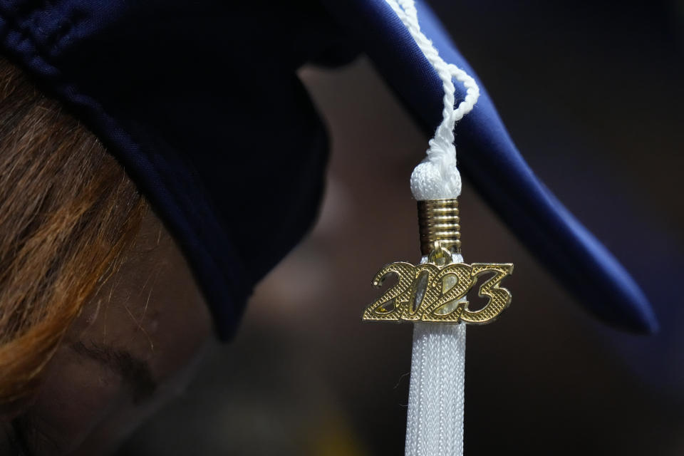 A tassel with 2023 on it is seen on a graduation cap during Howard University's commencement in Washington, Saturday, May 13, 2023. (AP Photo/Alex Brandon)