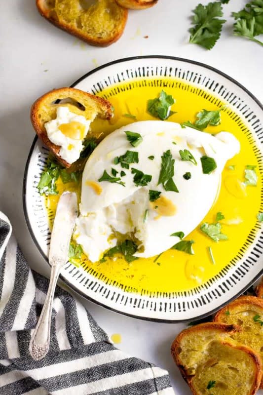 <p>Quick, easy, and delicious. This burrata appetizer takes about 10 minutes to prepare with just 5 simple ingredients.</p><p><strong>Get the recipe: <a href="https://midwestfoodieblog.com/burrata-appetizer-with-garlic-olive-oil/" rel="nofollow noopener" target="_blank" data-ylk="slk:Burrata Appetizer with Garlic and Olive Oil;elm:context_link;itc:0;sec:content-canvas" class="link "><em>Burrata Appetizer with Garlic and Olive Oil</em></a></strong></p>
