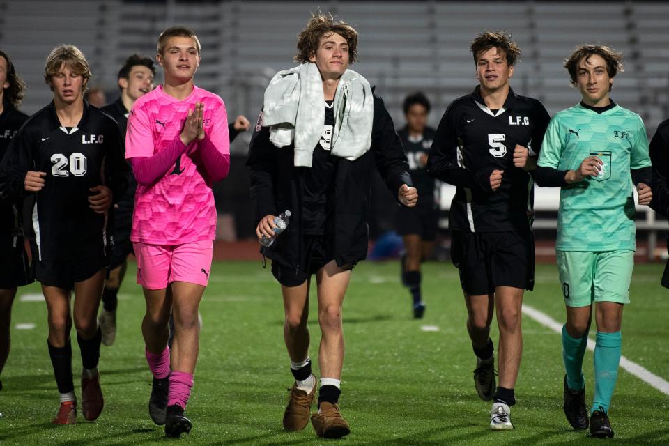 Faith Christian boys soccer team cheers after defeating Dock Mennonite at Central Bucks West High School in Doylestown on Tuesday, Nov. 1, 2022.