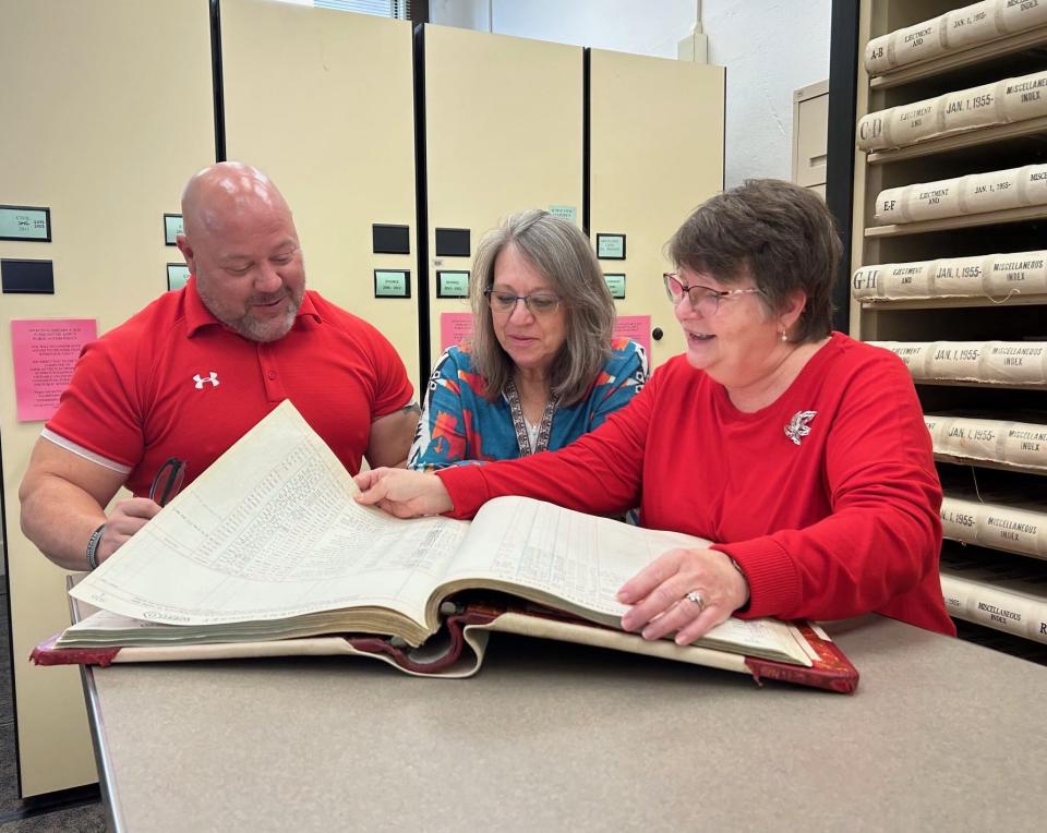 Prothonotary Brian Fochtman, at left is pictured with Second Deputy Kim Will, center, and First Deputy Jeannie Custer working in the Somerset County Prothonotary's office.