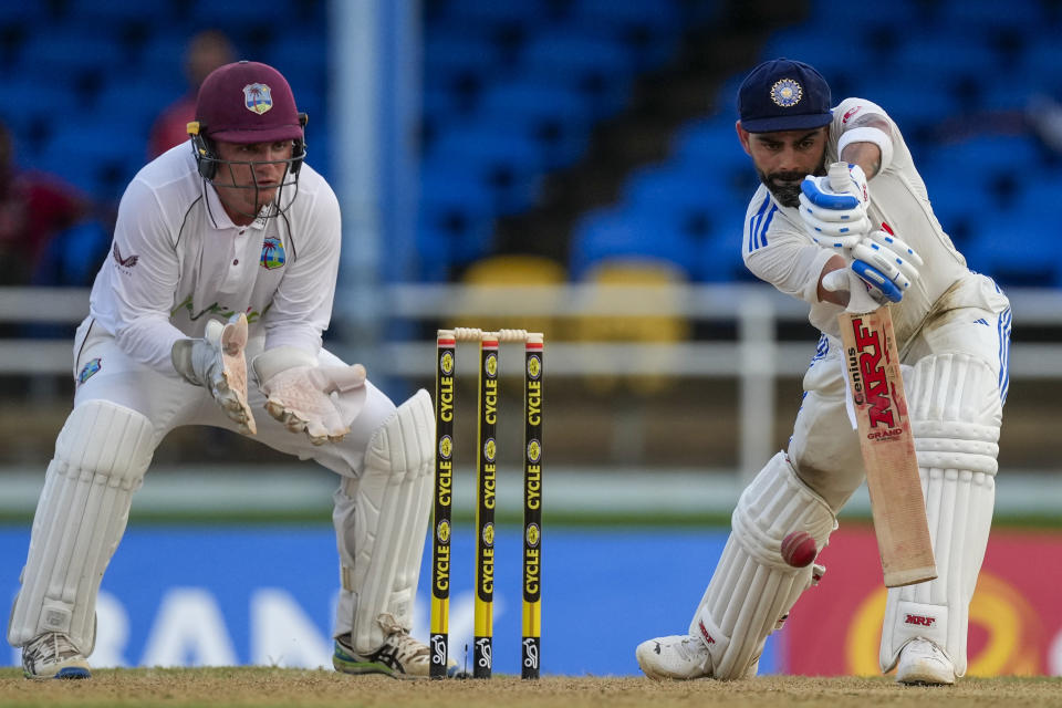 India's Virat Kohli plays a shot under the watch of West Indies' keeper Joshua Da Silva on day one of their second cricket Test match at Queen's Park in Port of Spain, Trinidad and Tobago, Thursday, July 20, 2023. (AP Photo/Ricardo Mazalan)