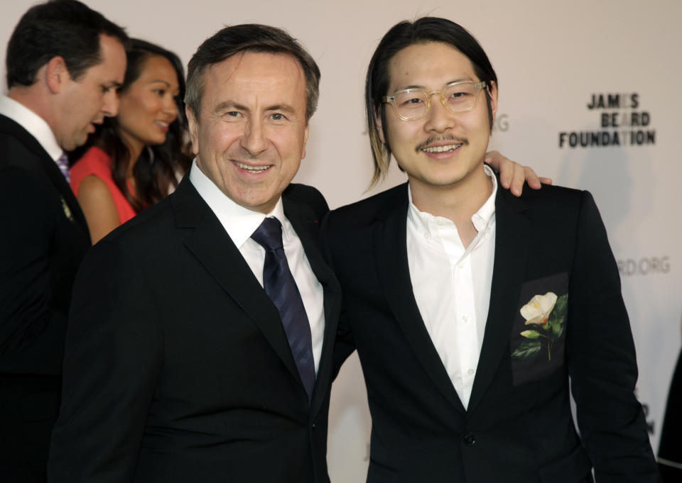 Restaurateurs Daniel Boulud, left, and Danny Bowien, right, attend the 2014 James Beard Foundation Awards on Monday, May 5, 2014, in New York. (Photo by Andy Kropa/Invision/AP)