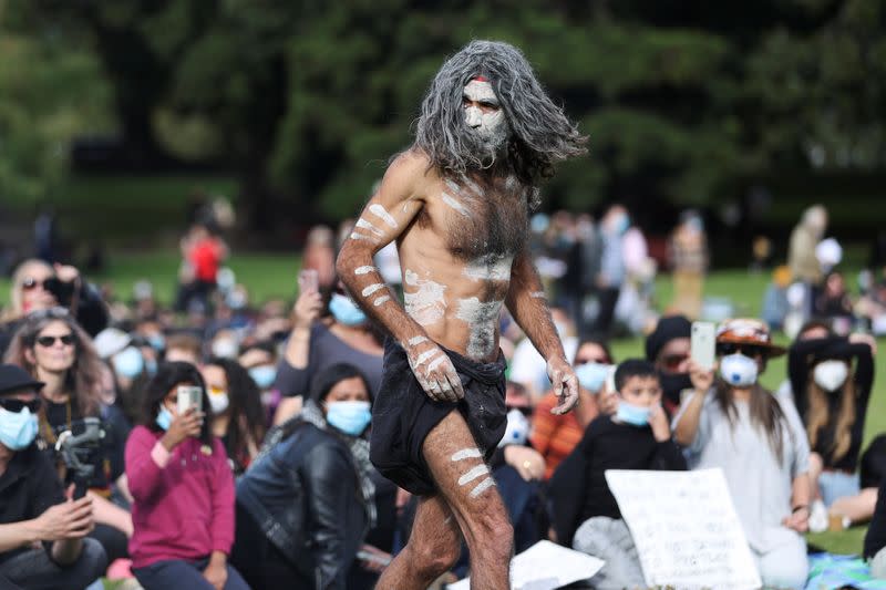 People demonstrate in solidarity with the Black Lives Matter (BLM) rallies in the United States, calling for an end to police brutality against Black people in the United States and First Nations people in Australia, in Sydney