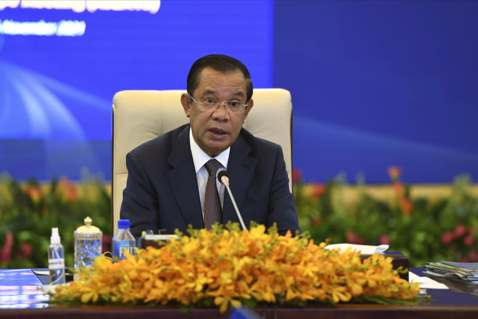 In this photo provided by An Khoun Sam Aun/Ministry of Information of Cambodia, Cambodian Prime Minister Hun Sen attends during an online opening session of the Asia-Europe Meeting (ASEM) in Phnom Penh, Cambodia, Thursday, Nov. 25, 2021. Hun Sen on Thursday welcomed leaders of Asian and European nations to the 13th biennial Asia-Europe Meeting, held virtually and postponed from last year due to the coronavirus pandemic. (An Khoun Sam Aun/Ministry of Information of Cambodia via AP)