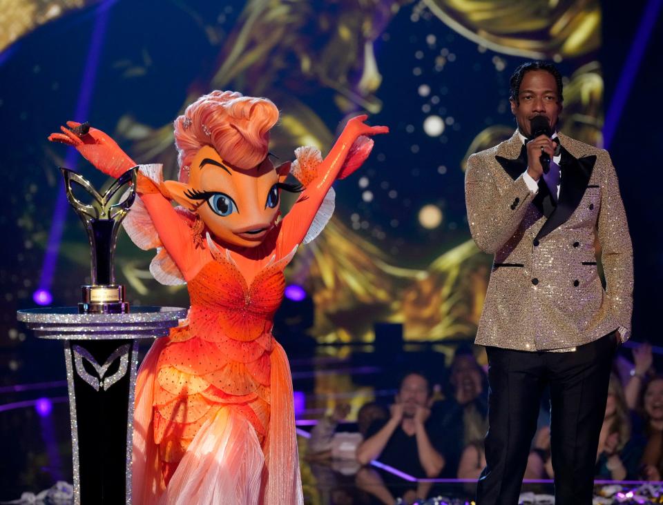 The Goldfish and host Nick Cannon during "The Masked Singer" Season 11 finale episode.