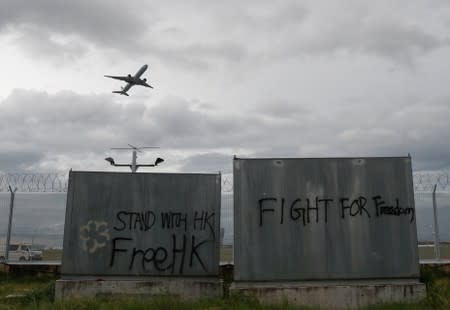 FILE PHOTO: A plane takes off at Hong Kong International Airport