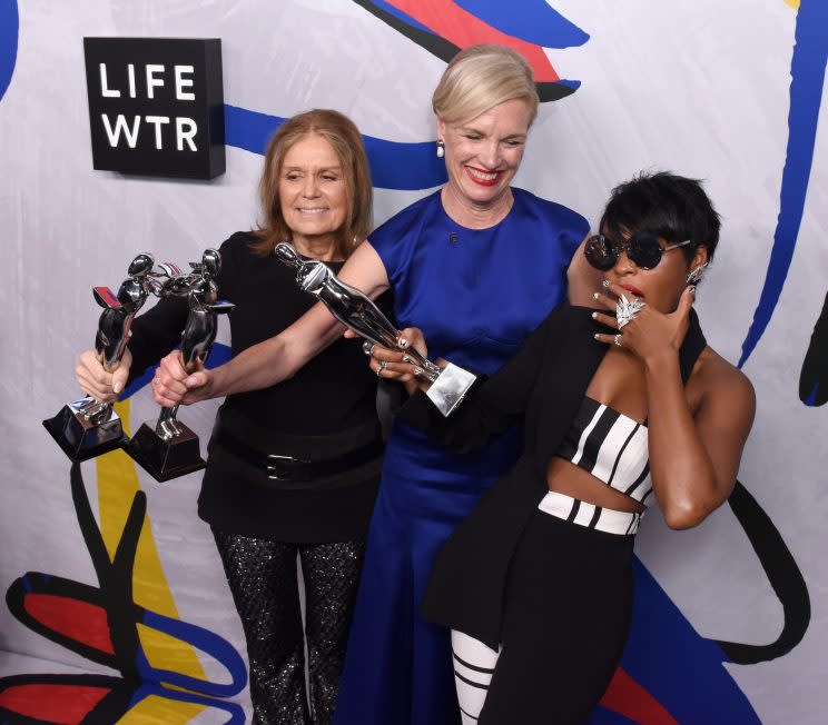 Gloria Steinem, Cecile Richards, and Janelle Monae posing with their Board of Directors’ Tribute Award. (Photo: Getty Images)