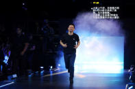 LeEco CEO and founder YT Jia runs on stage during a press event in San Francisco, California, U.S. October 19, 2016. RETUERS/Beck Diefenbach