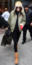 <p>The model shopped her way through N.Y.C. wearing a metallic green bomber and a pair of chestnut Uggs ($130; <a rel="nofollow noopener" href="http://www.anrdoezrs.net/links/7799179/type/dlg/sid/ISUggsIJJan/fragment/start%3D4%26cgid%3Dwomen-boots-classic-boots/http://www.ugg.com/women-boots-heritage-classic-boots/classic-short/5825.html?dwvar_5825_color=CHE" target="_blank" data-ylk="slk:ugg.com;elm:context_link;itc:0;sec:content-canvas" class="link ">ugg.com</a>). </p>