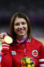 LONDON, ENGLAND - SEPTEMBER 01: Gold medalist Michelle Stilwell of Canada poses on the podium during the medal ceremony in the Women's 200m - T52 on day 3 of the London 2012 Paralympic Games at Olympic Stadium on September 1, 2012 in London, England. (Photo by Michael Steele/Getty Images)