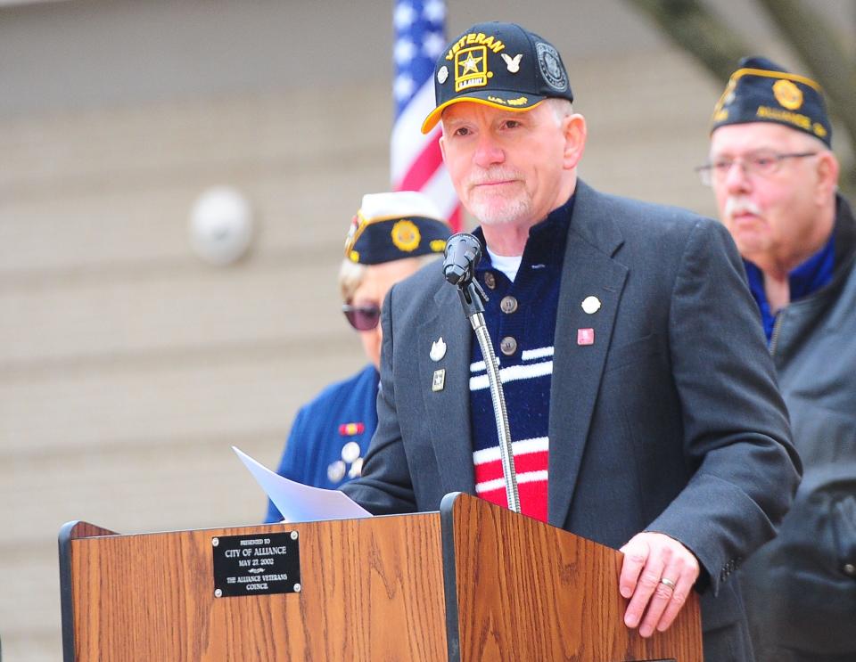 Brad Pietzcker of the Veterans Service Commission of Stark County delivers the keynote address Saturday, Nov. 11, 2023, during the Veterans Day service at Freedom Square in downtown Alliance.
