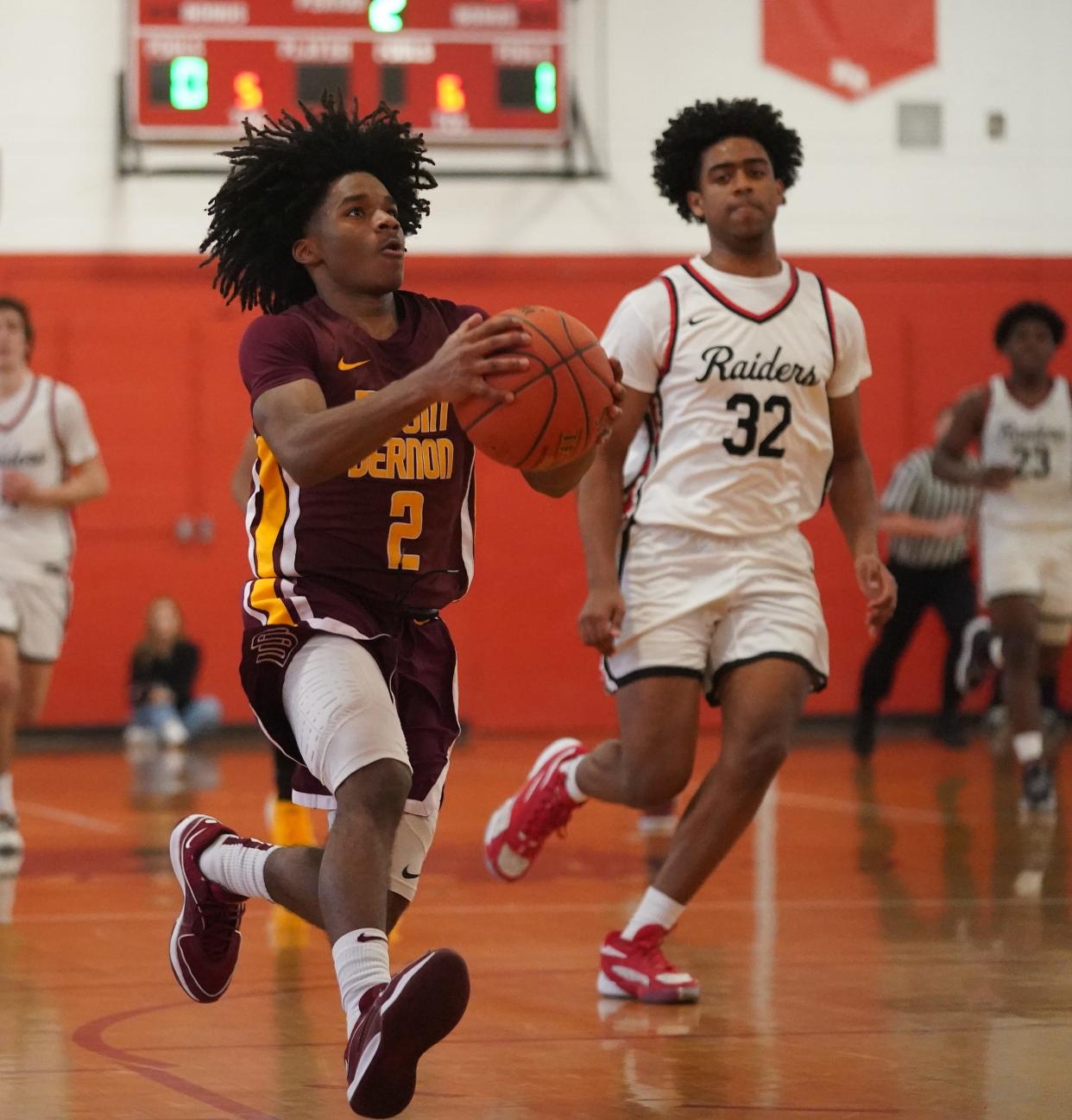 Mount Vernon's Tavien Tyler (2) drives to the basket in the Class AAA quarterfinal boys basketball game against North Rockland at North Rockland High School on Friday, Feb. 23, 2024.