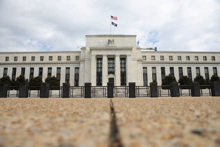 FILE PHOTO: The Federal Reserve building is pictured in Washington, DC, U.S., August 22, 2018. REUTERS/Chris Wattie