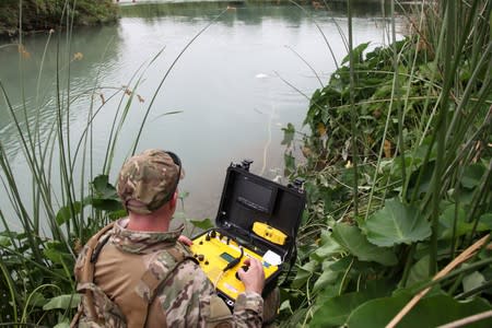 U.S. Border Patrol agents search for a missing 2-year-old in the Rio Grande River near Del Rio Texas