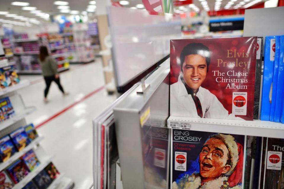 Christmas themed vinyl records by Elvis Presley and Bing Crosby are displayed for sale at a Target store in King of Prussia, Pennsylvania U.S.