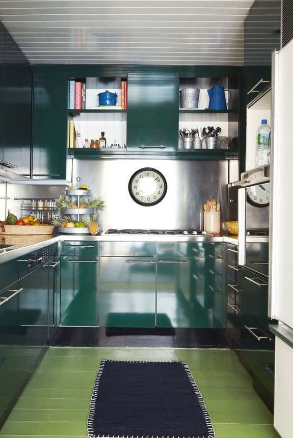 a kitchen with a large glass counter
