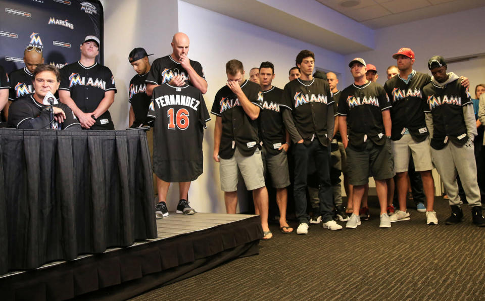 <p>Miami Marlins manager Don Mattingly reacts at the press conference announcing the death of starting pitcher Jose Fernandez in a boating accident as pitcher Mike Dunn holds the jersey of Fernandez (16) at Marlins Park. Mandatory Credit: Robert Mayer-USA TODAY Sports/Reuters)</p>