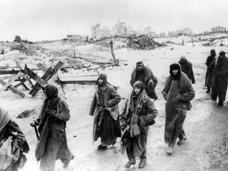 Captured German soldiers, make their way in the bitter cold through the ruins of Stalingrad, Russia, in 1943.