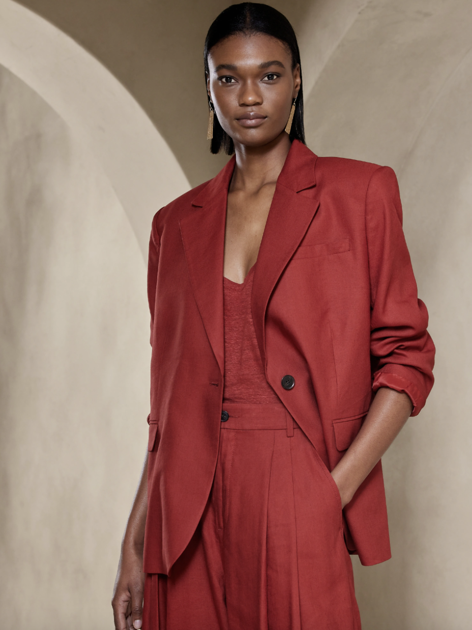 model wearing red pants, red shirt and red blazer, Lena Relaxed Linen-Blend Blazer in Red Embers (Photo via Banana Republic)