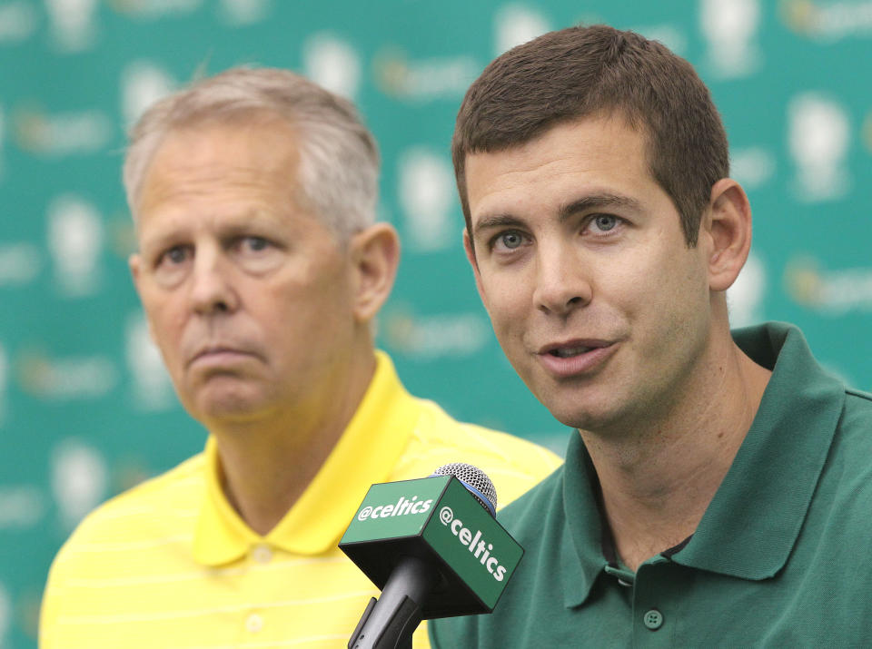 WALTHAM, MA - JUNE 30: Danny Ainge, left, president of basketball operations, and head coach Brad Stevens at the press conference. The Boston Celtics introduce their new draft picks, Marcus Smart and James Young, on Monday, June 30, 2014. (Photo by Pat Greenhouse/The Boston Globe via Getty Images)