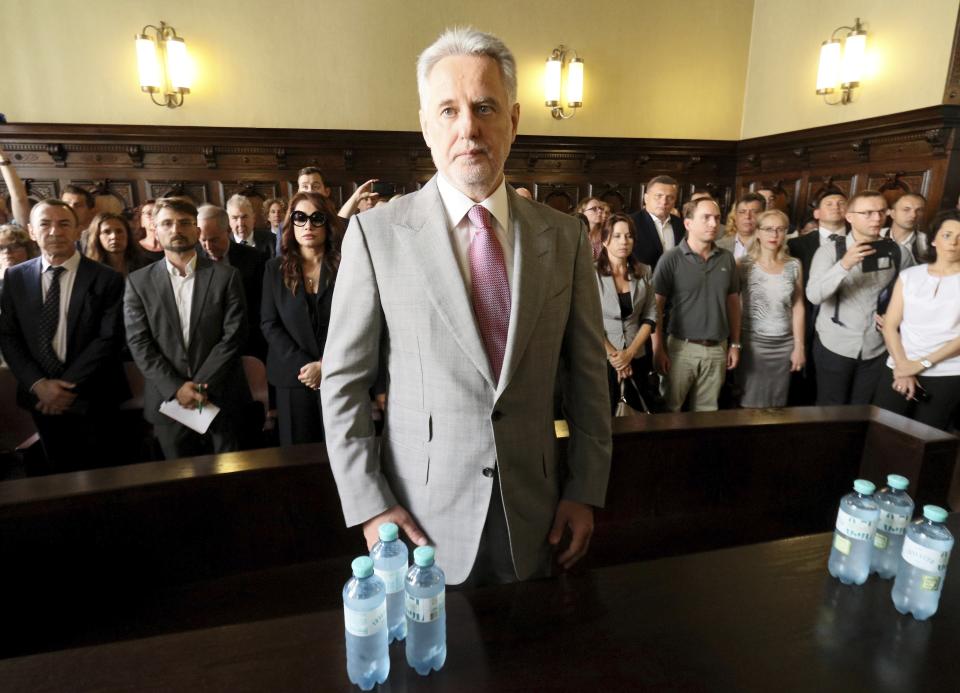 Ukrainian oligarch Dymitro Firtash waits for the start of his trial at the Austrian supreme court in Vienna, Austria, Tuesday, June 25, 2019. Austrian supreme court rules on extradition case of Ukrainian oligarch Dymitro Firtash to the US. (AP Photo/Ronald Zak)