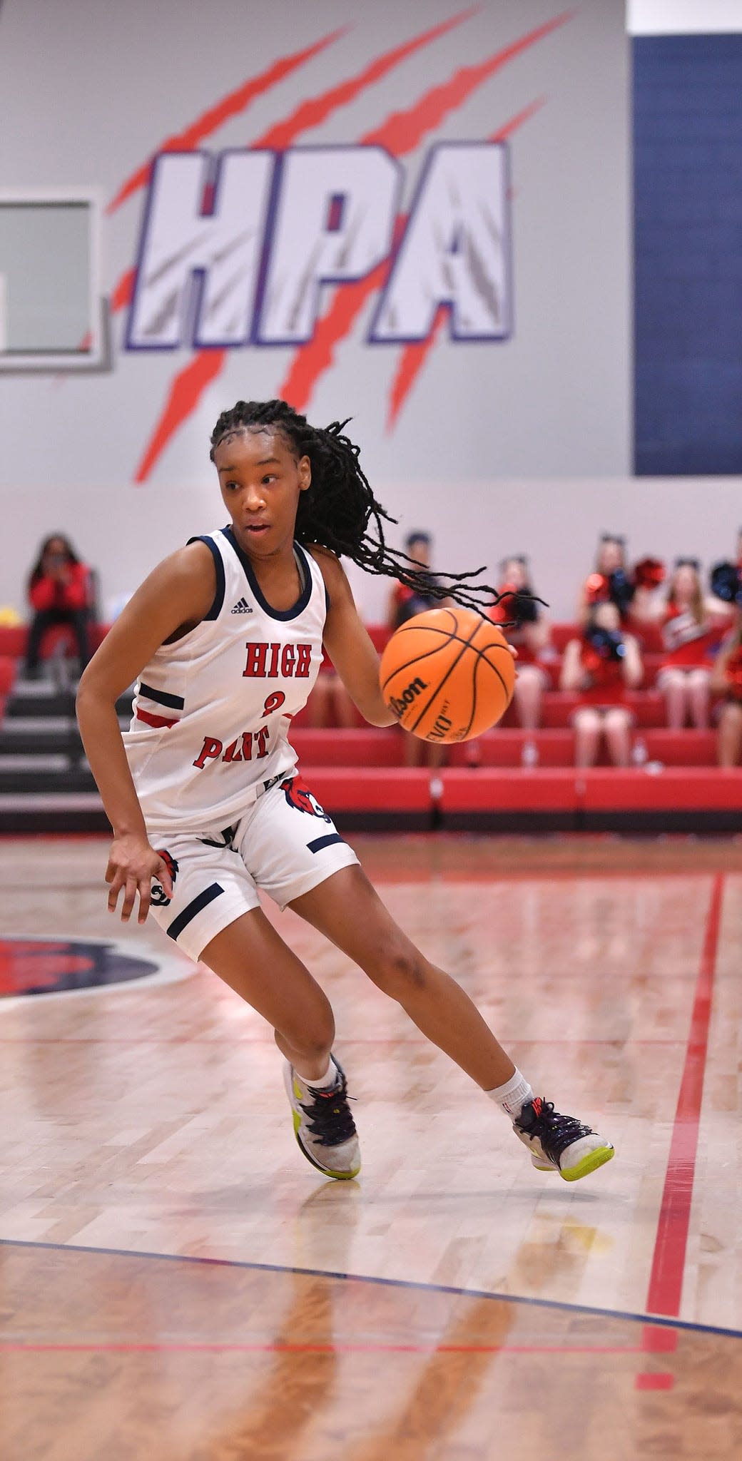 High Point Academy takes on Denmark-Olar High School in girls basketball action in the High Point Den in Spartanburg, Friday, February 26, 2021. High Point's Adiyah Owens (3) drives to the basket.