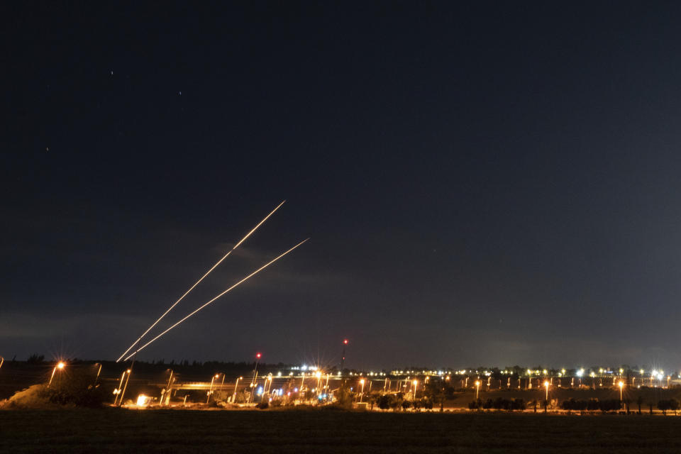 Rockets are launched from the Gaza Strip towards Israel are seen from Israeli side of the border, Tuesday, May 2, 2023. The Israeli military says that Palestinian militants in Gaza have fired a barrage of rockets following the death of Khader Adnan, a high-profile Palestinian prisoner in Israeli custody after a nearly three-month-long hunger strike. (AP Photo/Ohad Zwigenberg)