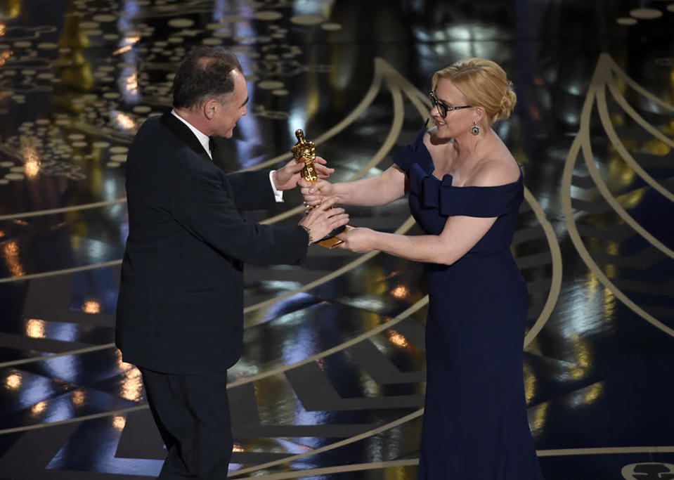 Patricia Arquette, right, presents Mark Rylance with the award for best actor in a supporting role for “Bridge of Spies” at the Oscars on Sunday, Feb. 28, 2016, at the Dolby Theatre in Los Angeles. 