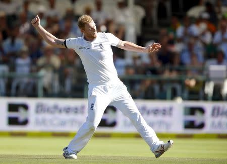 England's Ben Stokes celebrates the wicket of South Africa's Dean Elgar (not in picture) during the second cricket test match in Cape Town, South Africa, January 3, 2016. REUTERS/Mike Hutchings