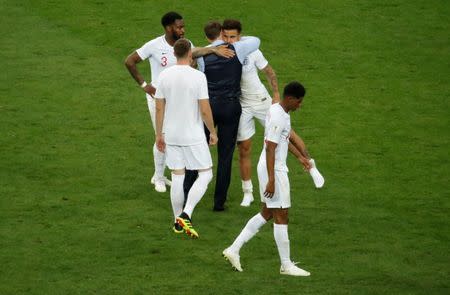 Soccer Football - World Cup - Semi Final - Croatia v England - Luzhniki Stadium, Moscow, Russia - July 11, 2018 England manager Gareth Southgate, Danny Rose, Kyle Walker and Marcus Rashford look dejected after the match REUTERS/Christian Hartmann